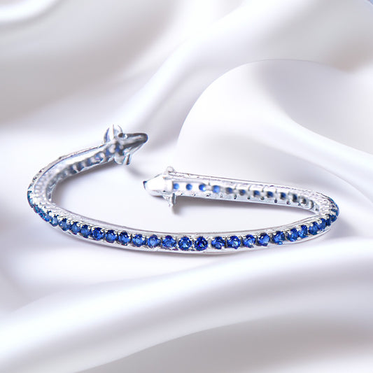 Royal Elegance: Blue Sapphires Silver Tennis Bracelet